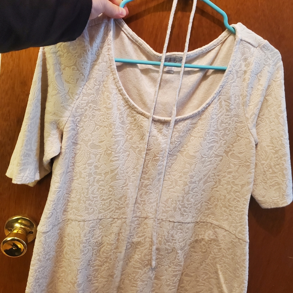 A Pea In The Pod cream maternity blouse, size large.